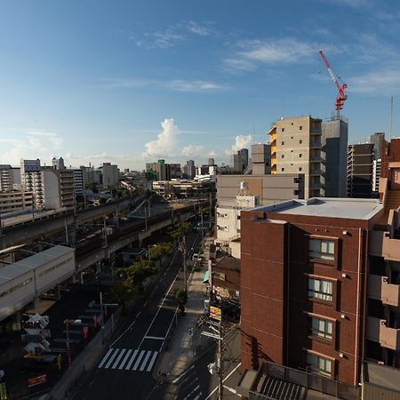 Апартаменты St Bld Daikoku Осака Экстерьер фото